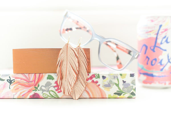 abby-rose-gold-leather-feather-earrings
